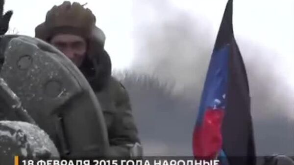 Среди грязного снега и полыхающей техники: 18 февраля 2015 года армии ДНР и ЛНР освободили от врага Дебальцево - Sputnik Узбекистан