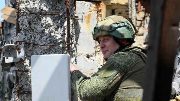 Связисты группировки войск Центр в ДНР - Sputnik Узбекистан