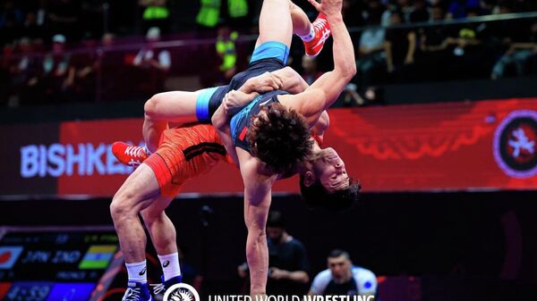 Узбекистанец Алишер Ганиев вышел в финал чемпионата Азии по спортивной борьбе - Sputnik Узбекистан