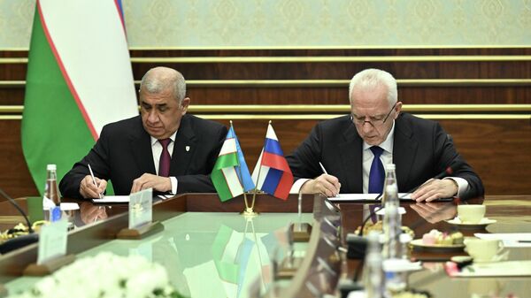 Александр Гуцан подписал с Генпрокурором Узбекистана новую Программу сотрудничества в Ташкенте
 - Sputnik Узбекистан