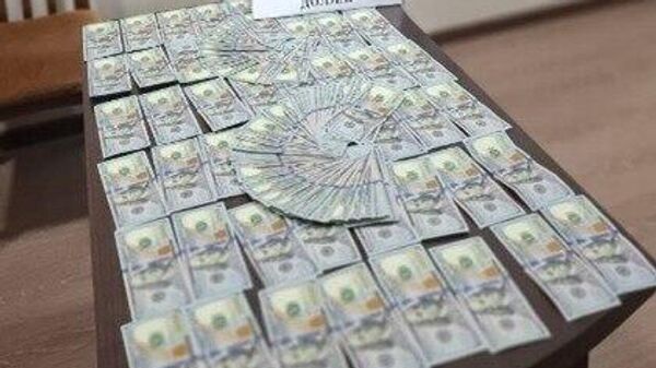 В Намангане по подозрению в коррупции задержали двух главных специалистов Главного управления строительства и ЖКХ - Sputnik Узбекистан