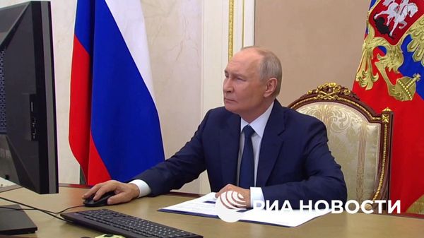 Путин голосует на выборах  - Sputnik Ўзбекистон