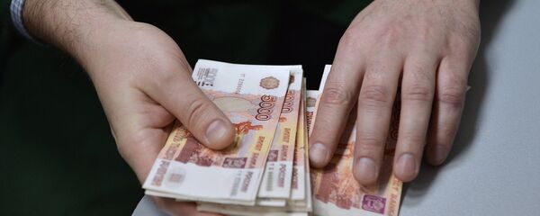 Деньги. Архивное фото. - Sputnik Узбекистан