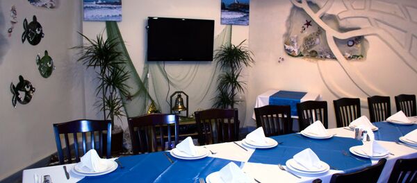 Интерьер московского ресторана ПЛОВ Интерьер московского ресторана ПЛОВ - Sputnik Ўзбекистон