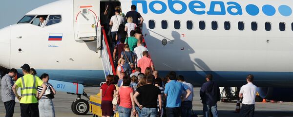 Самолет российской авиакомпании Победа Самолет российской авиакомпании Победа - Sputnik Узбекистан