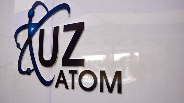 Logotip korporatsii Uzatom - Sputnik Oʻzbekiston