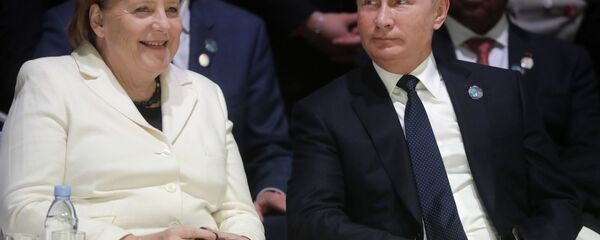 Владимир Путин и Ангела Меркель - Sputnik Узбекистан