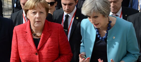 Канцлер ФРГ Ангела Меркель (слева) и премьер-министр Великобритании Тереза Мэй  - Sputnik Узбекистан