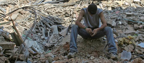 Жилой квартал в Бейруте после теракта Жилой квартал в Бейруте после теракта - Sputnik Узбекистан