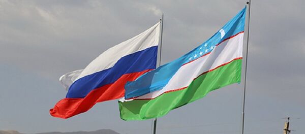 Флаги России и Узбекистана Флаги России и Узбекистана - Sputnik Ўзбекистон