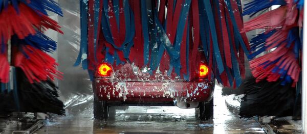 Автомобиль на мойке Автомобиль на мойке - Sputnik Ўзбекистон