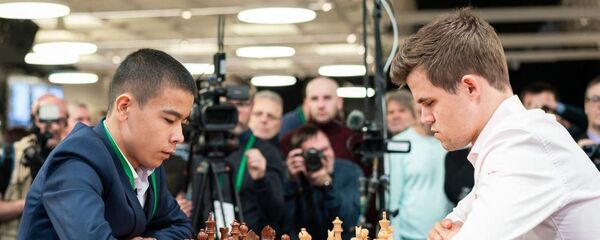 Шестнадцатилетний шахматист из Узбекистана победил действующего чемпиона мира Магнуса Карлсена Шестнадцатилетний шахматист из Узбекистана победил действующего чемпиона мира Магнуса Карлсена - Sputnik Узбекистан