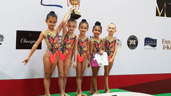 Юные гимнастки из Узбекистана на турнире в Дубае - Sputnik Узбекистан
