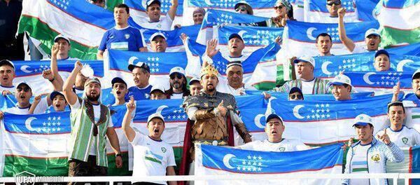 Болельщики на стадионе Шарджа Болельщики на стадионе Шарджа - Sputnik Узбекистан