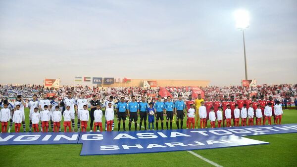 Команды Узбекистана и Омана перед матчем на Кубке Азии - Sputnik Узбекистан