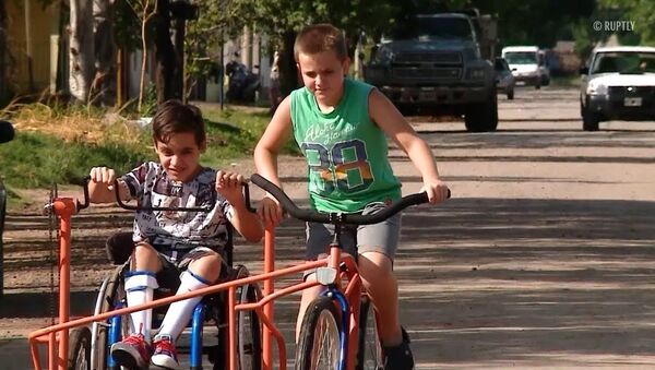 Кузнец из Аргентины смастерил велосипед с инвалидной коляской - Sputnik Узбекистан