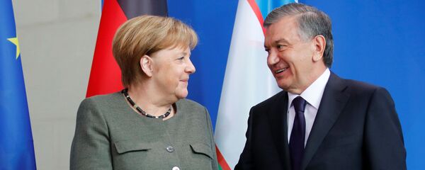 Президент Узбекистана Шавкат Мирзиёев и Канцлер ФРГ Ангела Меркель Президент Узбекистана Шавкат Мирзиёев и Канцлер ФРГ Ангела Меркель - Sputnik Ўзбекистон
