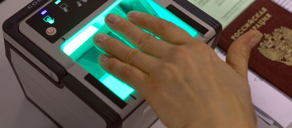 Процедура снятия биометрических данных в визовом центре Процедура снятия биометрических данных в визовом центре - Sputnik Узбекистан