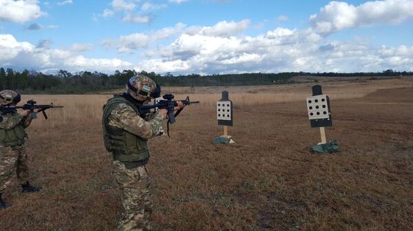 Спецназ Узбекистана впервые на учениях в США - фото Спецназ Узбекистана впервые на учениях в США - фото - Sputnik Узбекистан