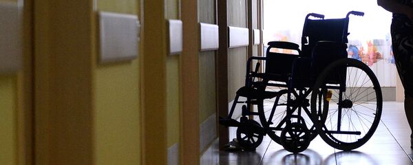 Пустая инвалидная коляска Пустая инвалидная коляска - Sputnik Ўзбекистон