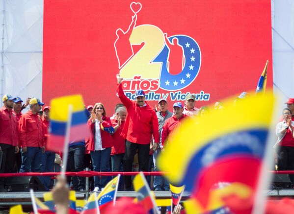 Президент Республики Венесуэла Николас Мадуро выступает на митинге в Каракасе - Sputnik Узбекистан