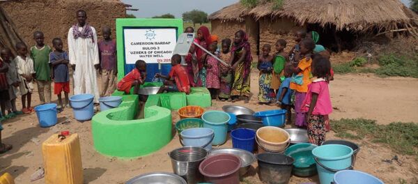 Узбекистанцы из Чикаго подарили колодец жителям Камеруна Узбекистанцы из Чикаго подарили колодец жителям Камеруна - Sputnik Ўзбекистон