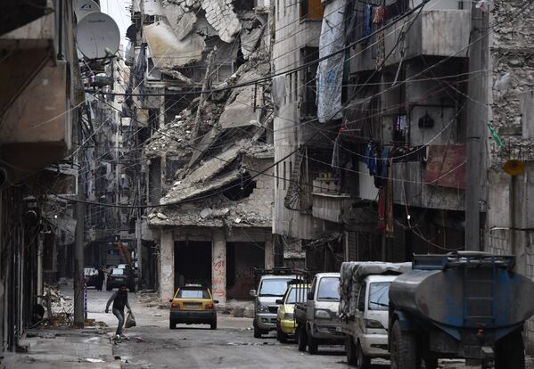 Разрушенный район сирийского Алеппо - Sputnik Узбекистан