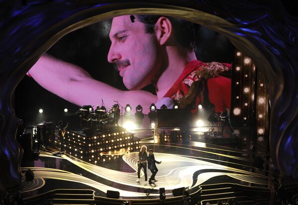 Выступление участников группы Queen и певца Адама Ламберта на церемонии вручения Оскар-2019 - Sputnik Узбекистан