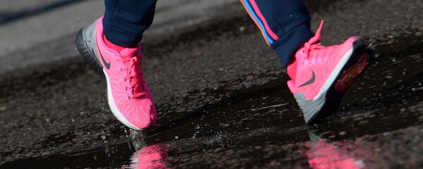 Участница марафона Участница марафона - Sputnik Ўзбекистон