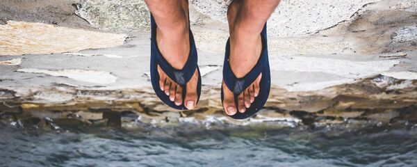 Ноги в шлепанцах - Sputnik Узбекистан