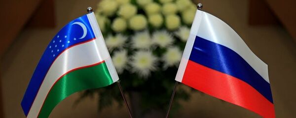 Флаги Узбекистана и России - Sputnik Ўзбекистон