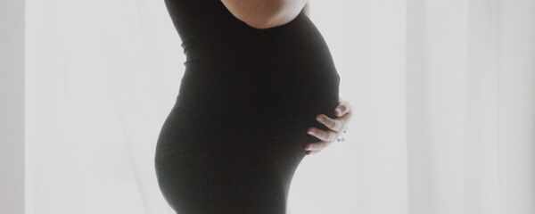 Беременная женщина Беременная женщина - Sputnik Ўзбекистон