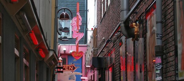 Амстердам. Один из переулков в квартале красных фонарей Амстердам. Один из переулков в квартале красных фонарей - Sputnik Ўзбекистон