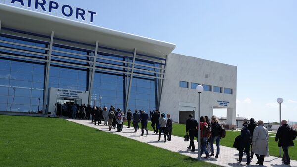 Гости прибывают в международный аэропорт города Термеза - Sputnik Ўзбекистон