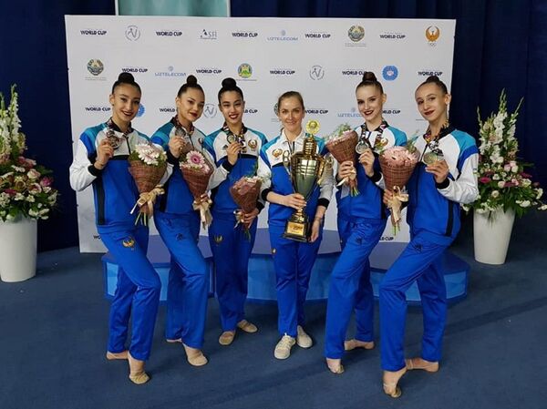 Гимнастки Узбекистана впервые в истории завоевали серебро на Кубке мира Гимнастки Узбекистана впервые в истории завоевали серебро на Кубке мира - Sputnik Узбекистан