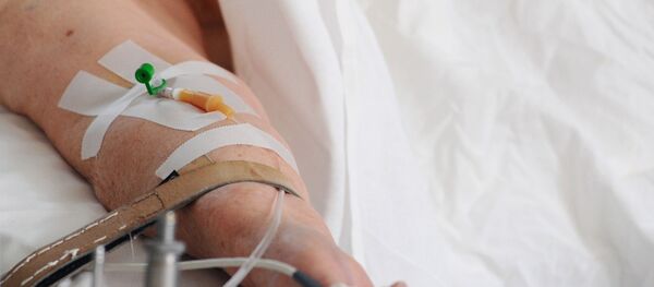 Пациент перед операцией в операционной в городской клинической больнице №3 г. Тамбова. Пациент перед операцией в операционной в городской клинической больнице №3 г. Тамбова. - Sputnik Ўзбекистон