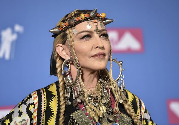 Мадонна 60-летняя певица, которая регулярно прибегает к помощи пластических хирургов
 - Sputnik Узбекистан