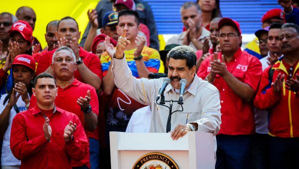 Aksiya v podderjku prezidenta Venesueli N. Maduro - Sputnik O‘zbekiston