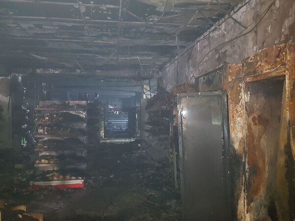 В торговом комплексе в Янгиюле произошел пожар – жуткое фото последствий В торговом комплексе в Янгиюле произошел пожар – жуткое фото последствий - Sputnik Узбекистан