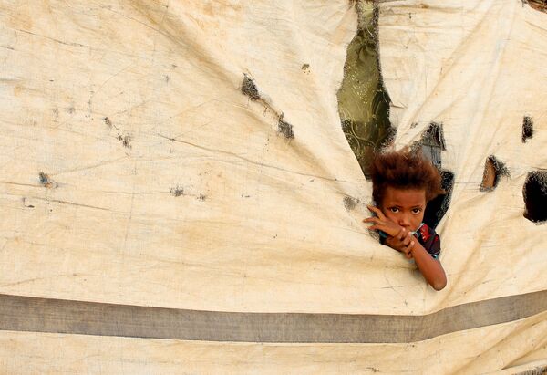 Ребенок в палаточном лагере в провинции Абс, Йемен - Sputnik Узбекистан