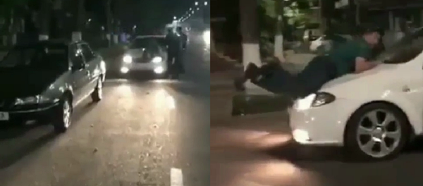 Сотрудника ГУВД прокатили на капоте - видео Сотрудника ГУВД прокатили на капоте - видео - Sputnik Узбекистан