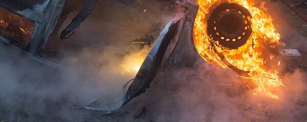 Горящий автомобиль. Иллюстративное фото Горящий автомобиль. Иллюстративное фото - Sputnik Ўзбекистон