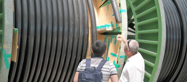 Производство высоковольтных кабелей в Наваи СЭЗ Производство высоковольтных кабелей в Наваи СЭЗ - Sputnik Ўзбекистон