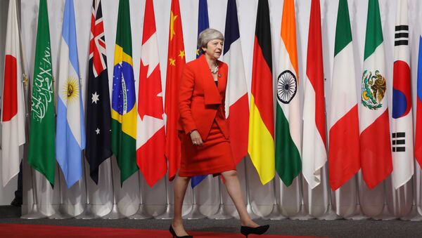 Премьер-министр Великобритании Тереза Мэй на саммите G20 в Осаке - Sputnik Ўзбекистон