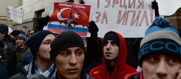 Акция протеста в Москве против действий ВВС Турции Акция протеста в Москве против действий ВВС Турции - Sputnik Узбекистан