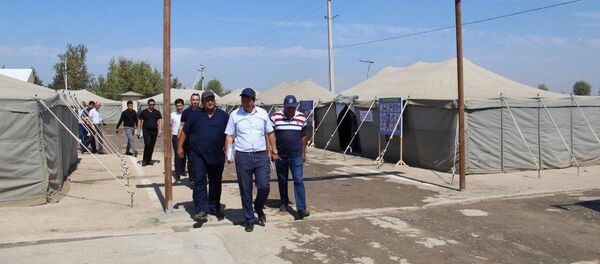 Палаточный городок для сборщиков хлопка в Сырдарье Палаточный городок для сборщиков хлопка в Сырдарье - Sputnik Ўзбекистон