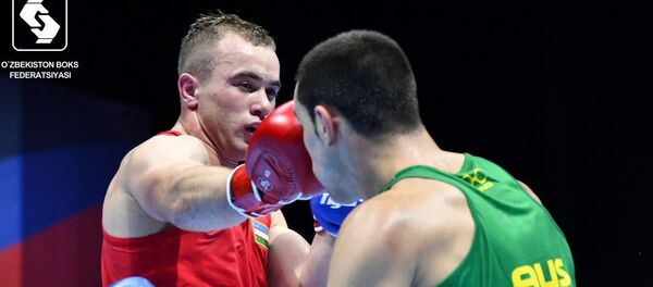 Узбекский боксер Фанат Кахрамонов на ЧМ-2019 в Екатеринбурге - Sputnik Узбекистан