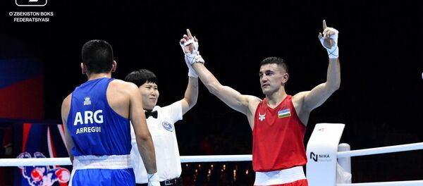 Батуров Бобоусмон одержал убедительную победу над Арегуи Бриан Агустином из Аргентины. Батуров Бобоусмон одержал убедительную победу над Арегуи Бриан Агустином из Аргентины. - Sputnik Ўзбекистон