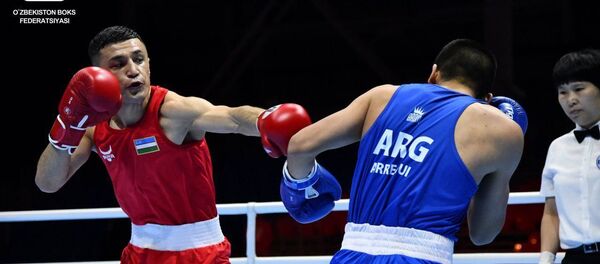 Батуров Бобоусмон одержал убедительную победу над Арегуи Бриан Агустином из Аргентины. Батуров Бобоусмон одержал убедительную победу над Арегуи Бриан Агустином из Аргентины. - Sputnik Ўзбекистон