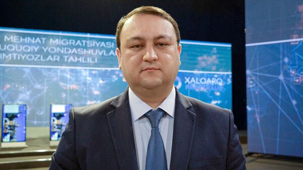 Директор Департамента розничного бизнеса Нацбанка Узбекистана Ихбол Мамажанов - Sputnik Узбекистан